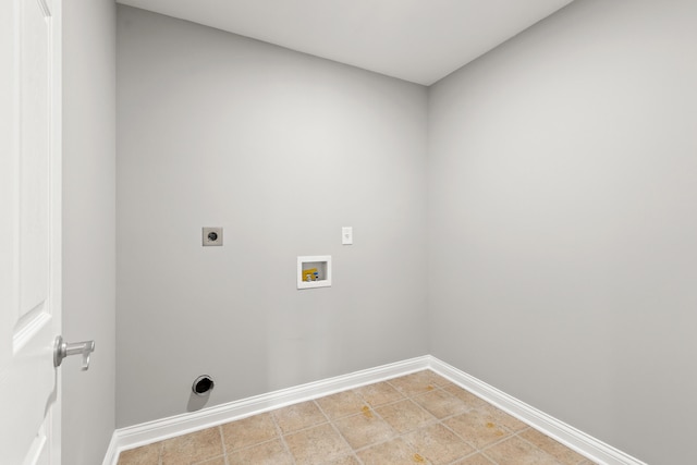 clothes washing area featuring laundry area, washer hookup, baseboards, and electric dryer hookup