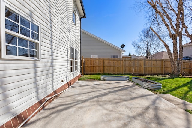 view of patio featuring fence