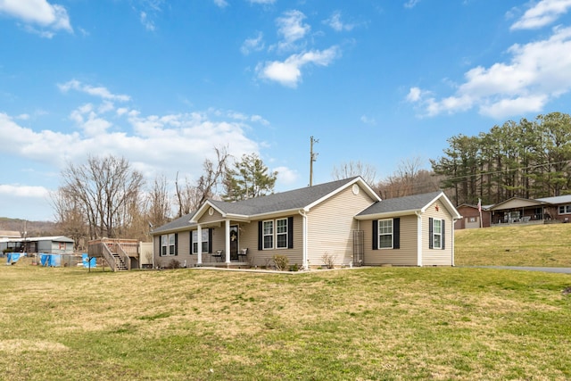 ranch-style home with a front lawn