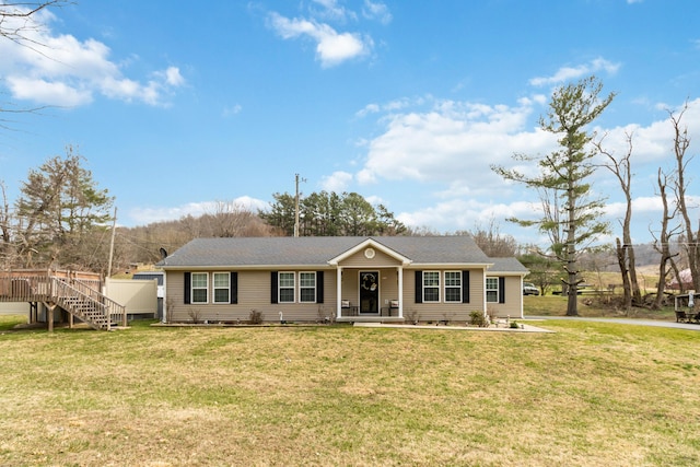 ranch-style home with a front yard