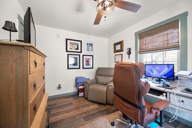 office space featuring a ceiling fan, wood finished floors, and baseboards