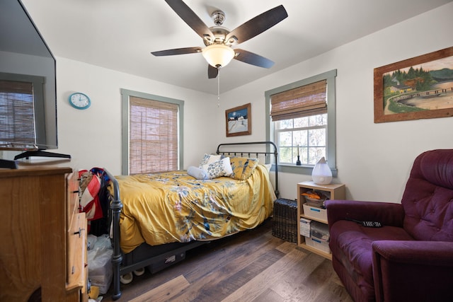 bedroom featuring ceiling fan and wood finished floors