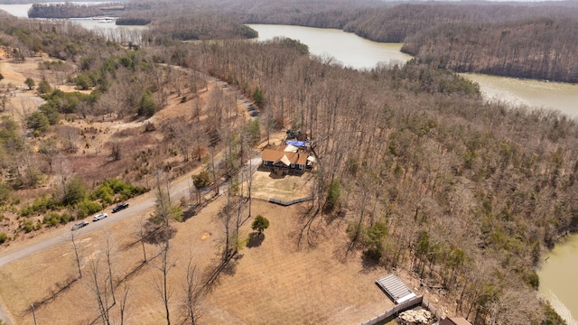 bird's eye view with a forest view and a water view