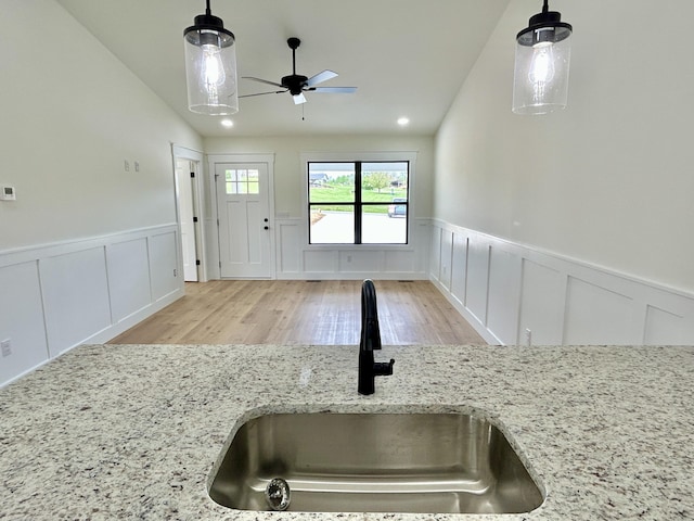 1403 Kit Cowan Rd, Somerset, KY 42503 - interior space featuring a sink, vaulted ceiling, and a decorative wall