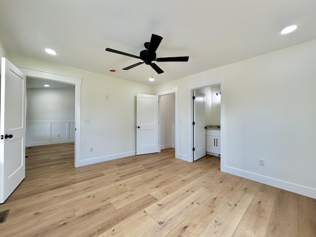 1403 Kit Cowan Rd, Somerset, KY 42503 - unfurnished bedroom with visible vents, light wood-type flooring, ensuite bathroom, and baseboards
