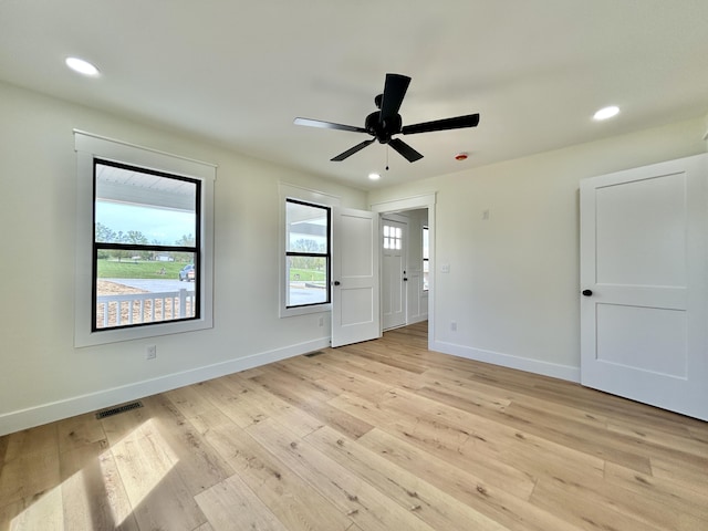 1403 Kit Cowan Rd, Somerset, KY 42503 - spare room with baseboards, visible vents, a ceiling fan, and light wood finished floors