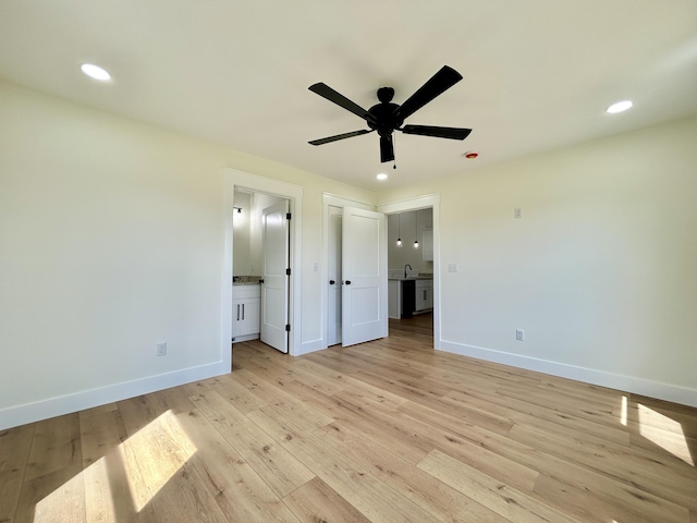 1403 Kit Cowan Rd, Somerset, KY 42503 - unfurnished bedroom with baseboards, light wood-type flooring, connected bathroom, and recessed lighting