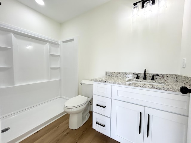 1403 Kit Cowan Rd, Somerset, KY 42503 - bathroom with toilet, vanity, a shower stall, and wood finished floors