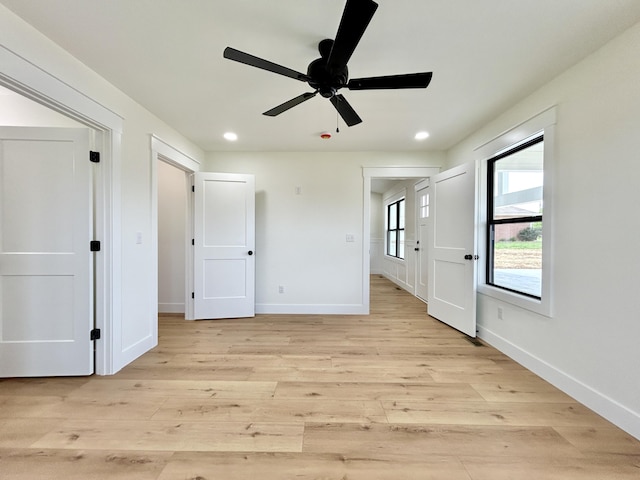 1403 Kit Cowan Rd, Somerset, KY 42503 - unfurnished bedroom with recessed lighting, light wood finished floors, and baseboards