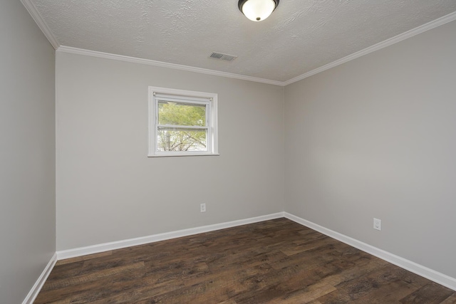 empty room with visible vents, ornamental molding, a textured ceiling, baseboards, and dark wood-style flooring