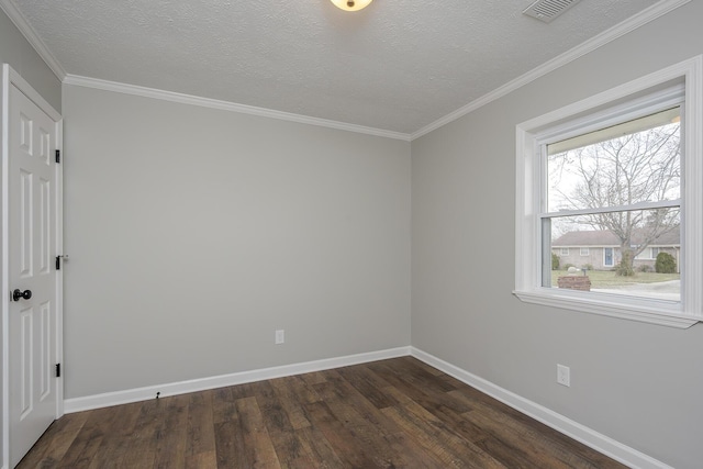 empty room with visible vents, baseboards, dark wood-type flooring, a textured ceiling, and crown molding