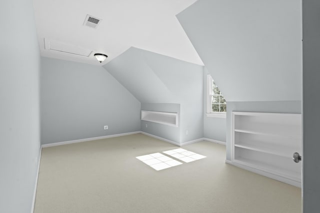 bonus room with vaulted ceiling, baseboards, visible vents, and carpet floors