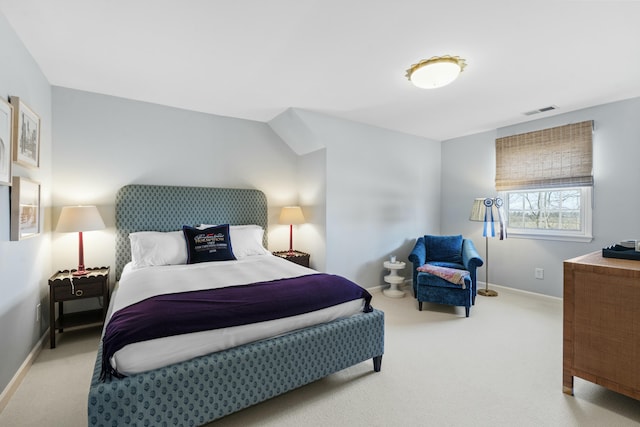 bedroom with visible vents, baseboards, and carpet floors