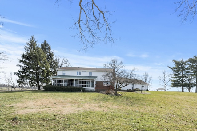 exterior space featuring a sunroom