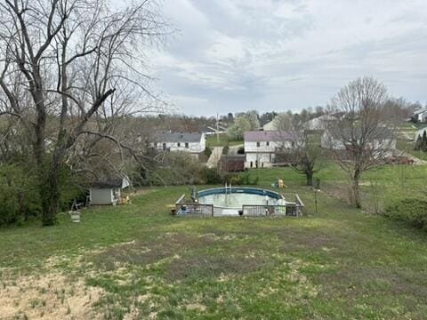 110 Silvercreek Dr, Danville, KY 40422 - view of yard with an outbuilding and a fenced in pool