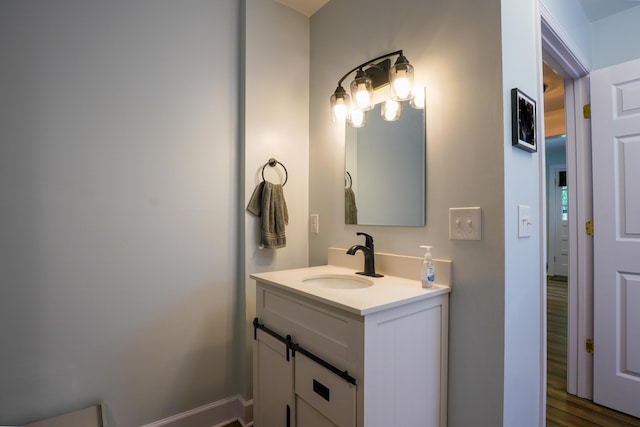 212 Williamsburg Ct, Danville, KY 40422 - bathroom featuring vanity, baseboards, and wood finished floors