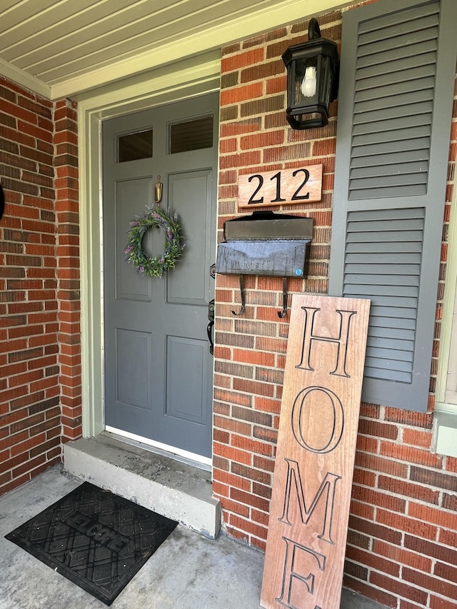 212 Williamsburg Ct, Danville, KY 40422 - doorway to property featuring brick siding