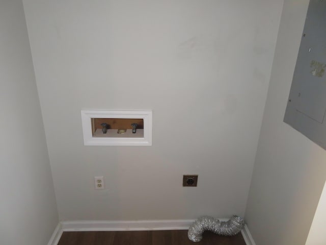 laundry room featuring hookup for a washing machine, wood finished floors, laundry area, electric panel, and electric dryer hookup