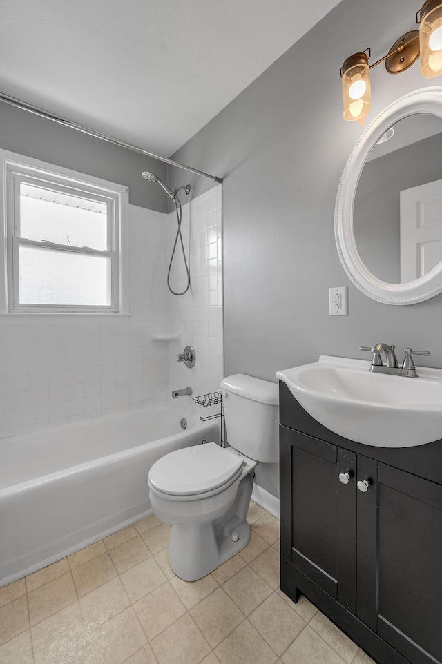 full bathroom with tile patterned floors, toilet, tub / shower combination, and vanity