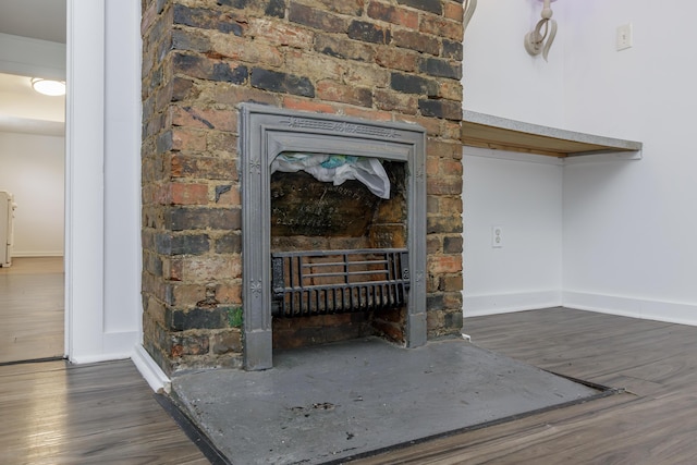 416 Ash St, Lexington, KY 40508 - room details with baseboards and wood finished floors