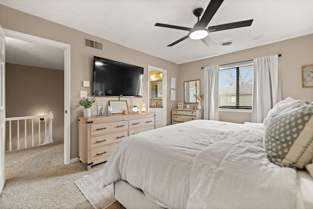 bedroom featuring ceiling fan, baseboards, light colored carpet, and visible vents