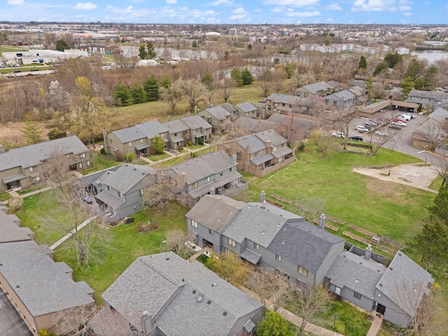 birds eye view of property with a residential view