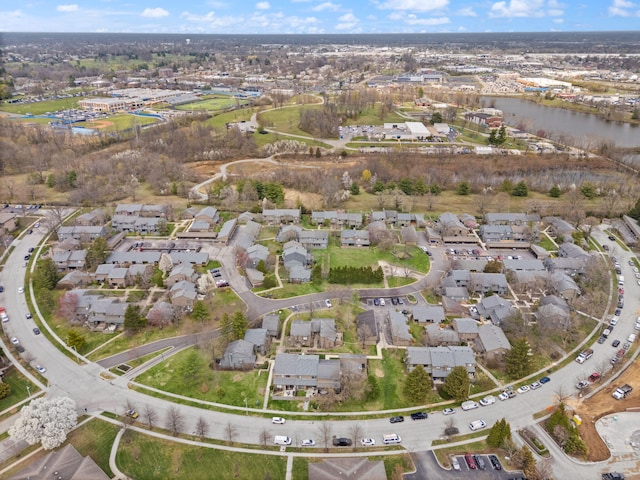 bird's eye view featuring a residential view and a water view