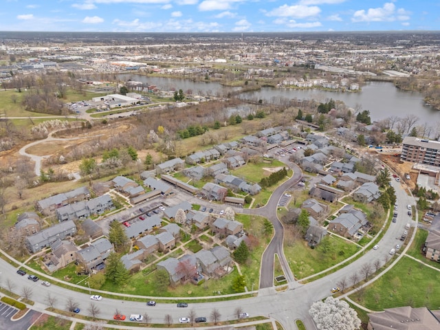 bird's eye view with a residential view and a water view