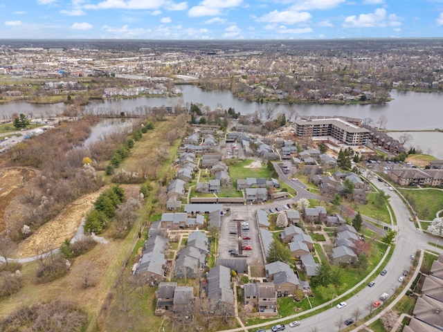 aerial view with a water view and a residential view