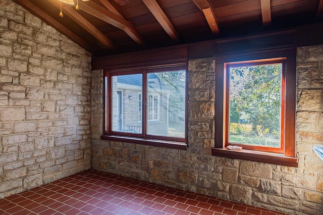 spare room featuring wood ceiling and vaulted ceiling with beams