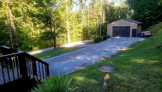 278 John Dr, Burnside, KY 42519 - exterior space featuring an outdoor structure, a garage, and driveway