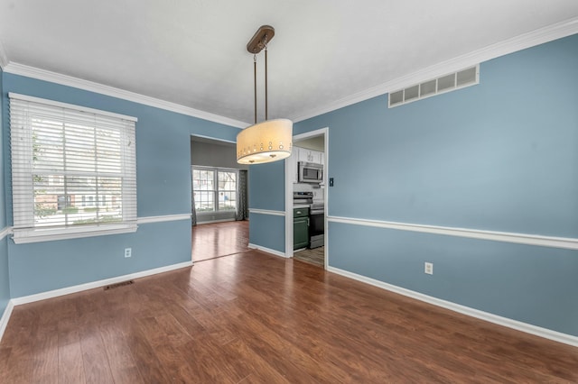 interior space with visible vents, baseboards, dark wood-style floors, and ornamental molding