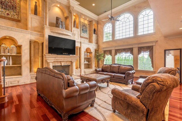 2208 Terranova Ct, Lexington, KY 40513 - living room featuring built in features, hardwood / wood-style floors, and crown molding