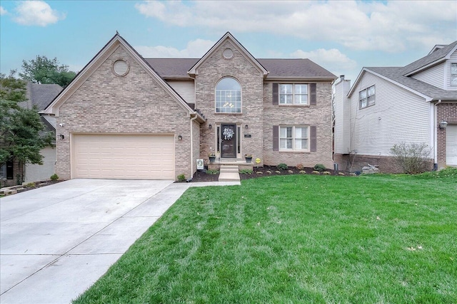 424 Amberley Dr, Lexington, KY 40515 - view of front of house featuring brick siding, a front yard, driveway, and an attached garage