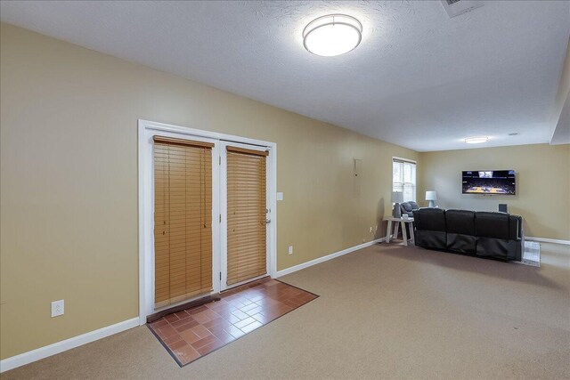 424 Amberley Dr, Lexington, KY 40515 - carpeted foyer featuring baseboards and a textured ceiling