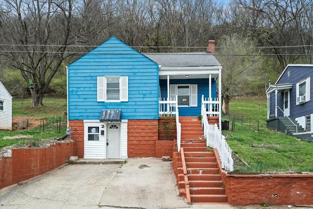 312 Murrell St, Frankfort, KY 40601 - view of front of house featuring stairway, roof with shingles, a porch, and a chimney