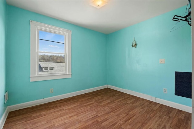 312 Murrell St, Frankfort, KY 40601 - empty room with baseboards and wood finished floors