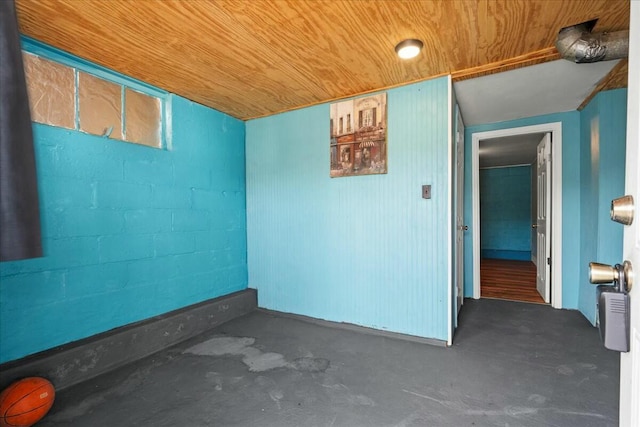 312 Murrell St, Frankfort, KY 40601 - unfurnished room with concrete floors, wood ceiling, and concrete block wall