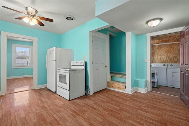 312 Murrell St, Frankfort, KY 40601 - kitchen featuring a ceiling fan, washing machine and dryer, white appliances, light wood finished floors, and baseboards