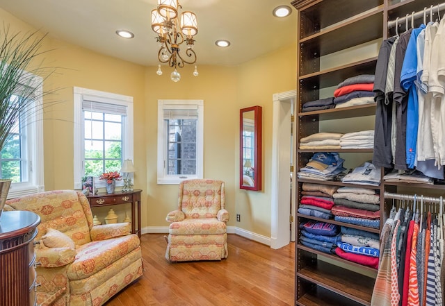 870 Mcmeekin Pl, Lexington, KY 40502 - living area with baseboards, wood finished floors, recessed lighting, and a chandelier