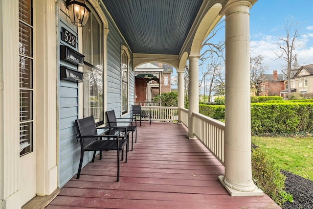wooden terrace with covered porch