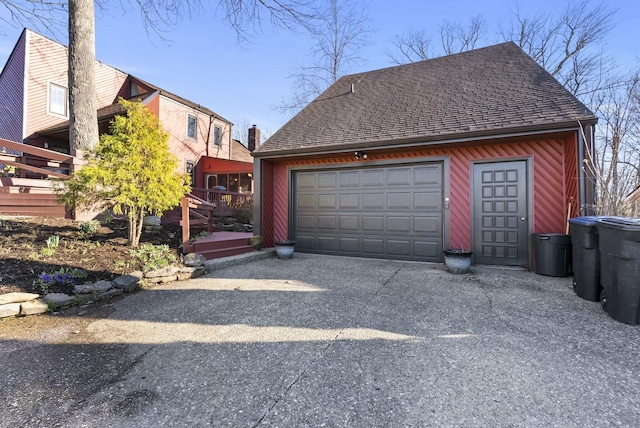380 Harrodswood Rd, Frankfort, KY 40601 - exterior space with a garage, an outdoor structure, and a shingled roof