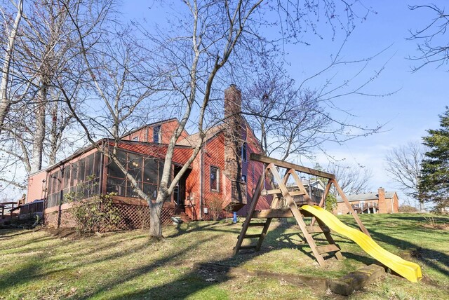 380 Harrodswood Rd, Frankfort, KY 40601 - exterior space featuring a yard, a sunroom, a chimney, and a playground