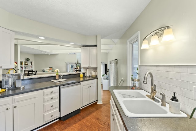 380 Harrodswood Rd, Frankfort, KY 40601 - kitchen featuring dark wood finished floors, white dishwasher, a sink, white cabinetry, and dark countertops