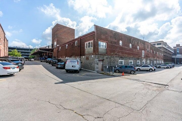 exterior space featuring uncovered parking