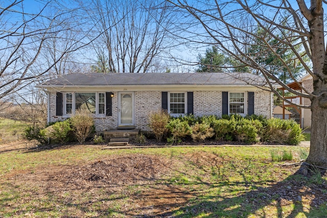 ranch-style house with brick siding