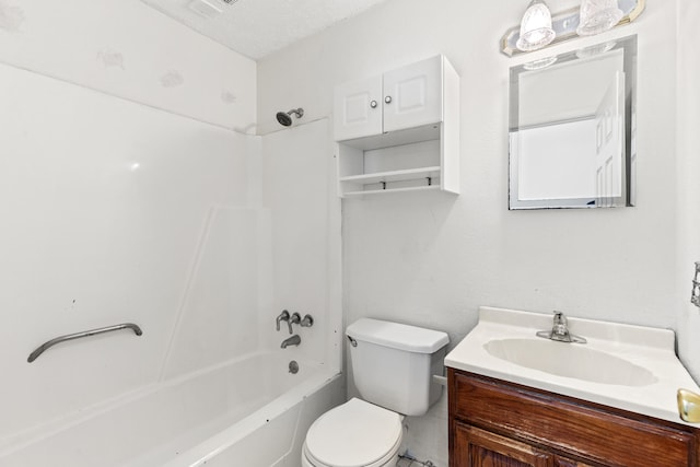 bathroom featuring shower / bath combination, vanity, and toilet