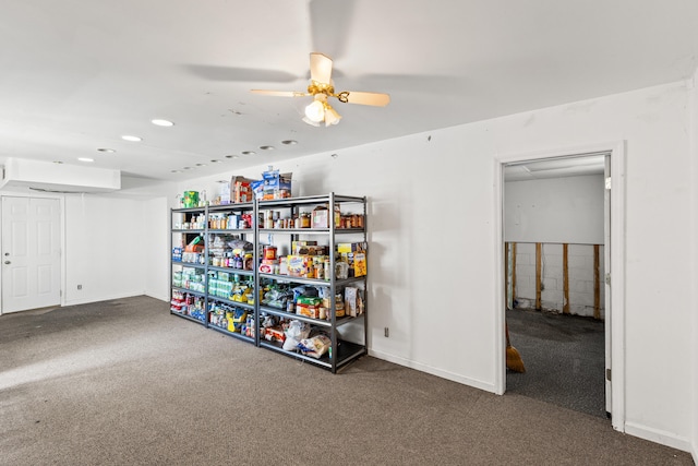 basement with baseboards, carpet, recessed lighting, and ceiling fan