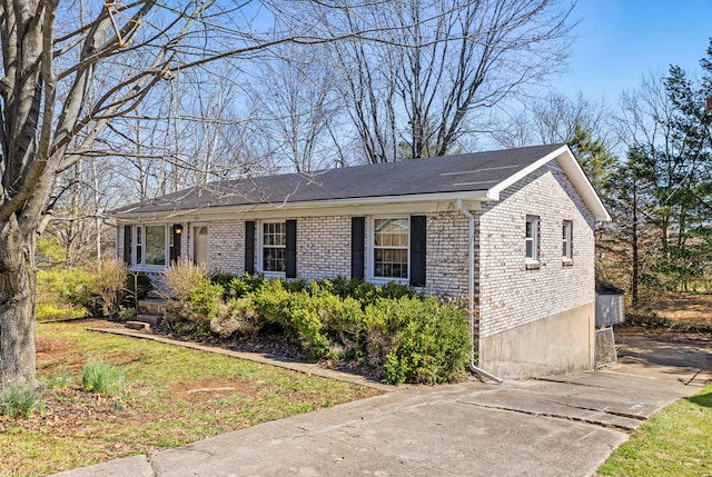 view of front of house with brick siding