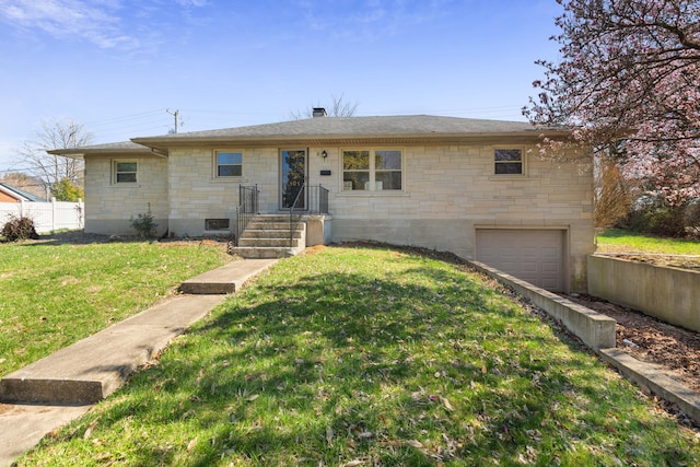 ranch-style home with a front yard, a garage, stone siding, and a chimney